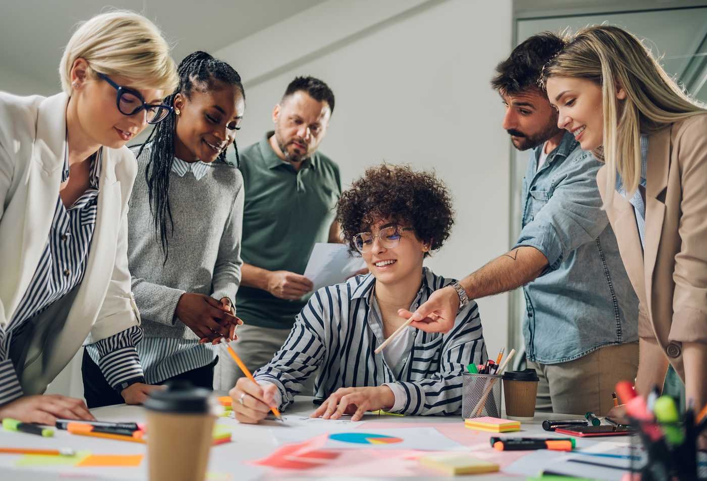 A professional reviews analytics on screen, showcasing innovation in ASU's Global Management (Creative Industries and Design Thinking), MGM program.