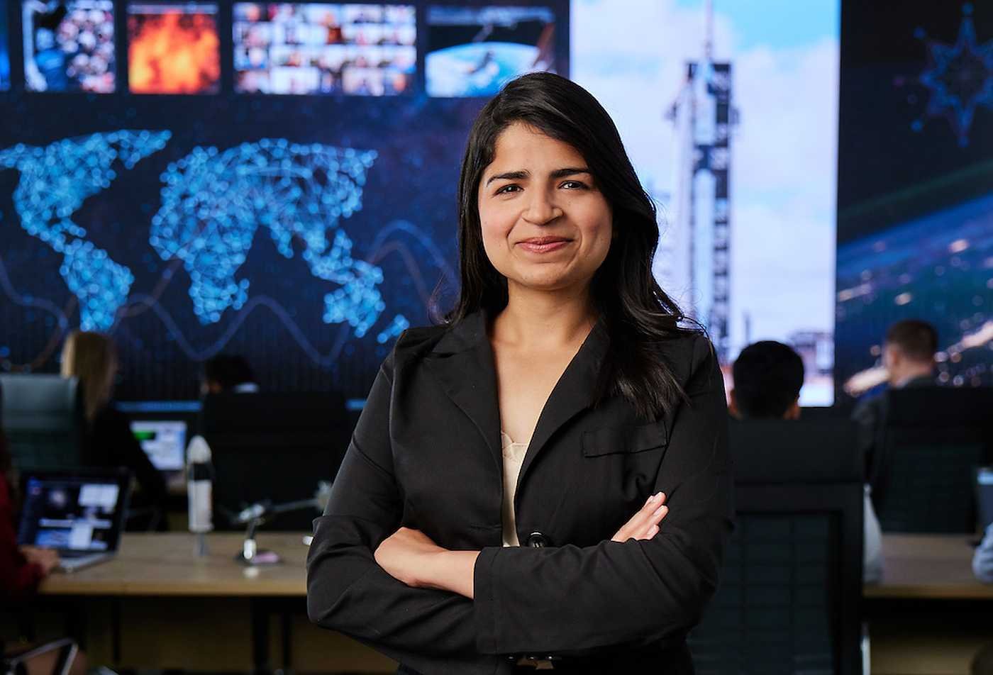 A leader analyzes data dashboards, reflecting strategy in ASU's Global Management - Executive (Space Leadership, Business and Policy), MGM program.