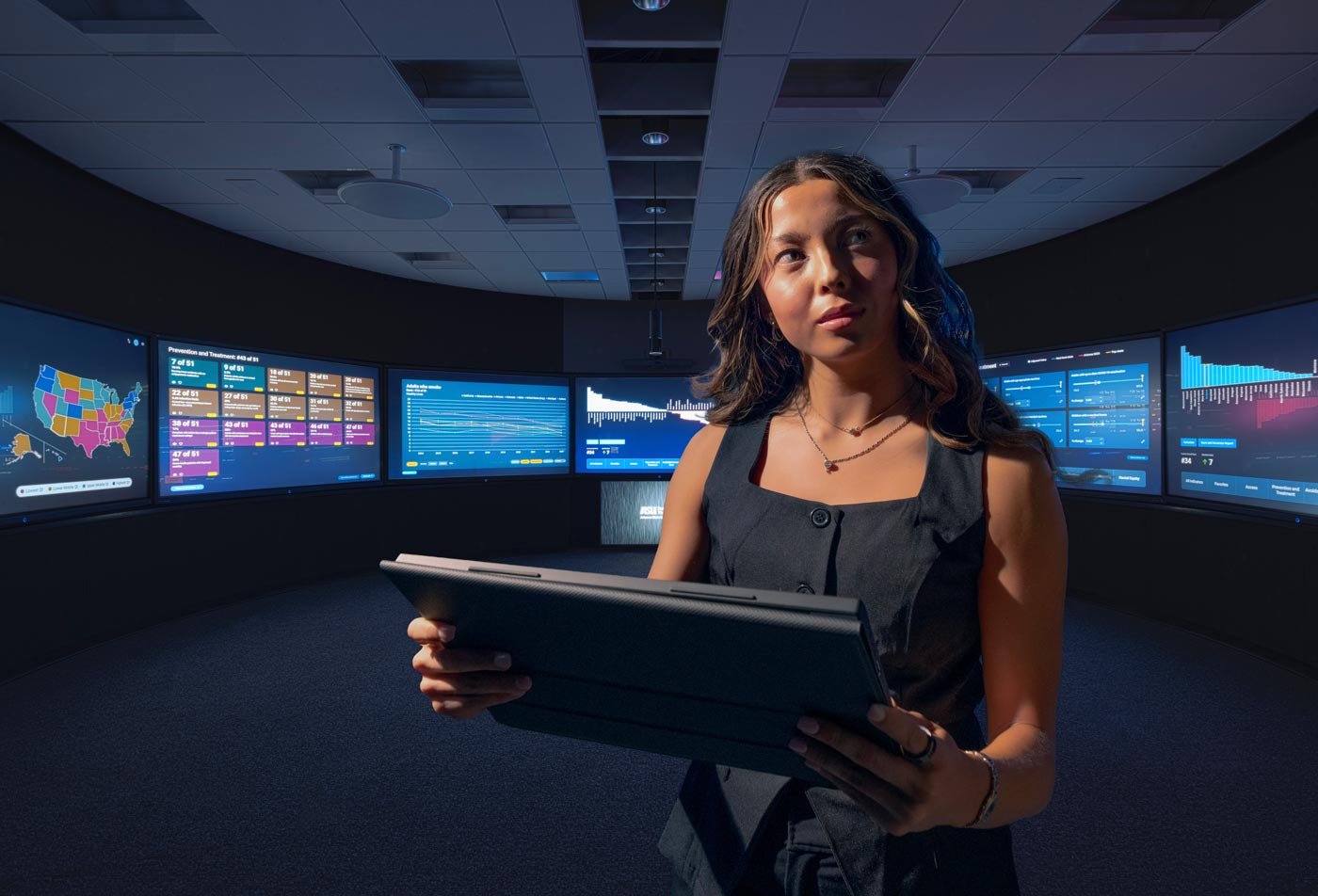 Student experiencing Decision Theater as part of the Public Health Technology master's degree program