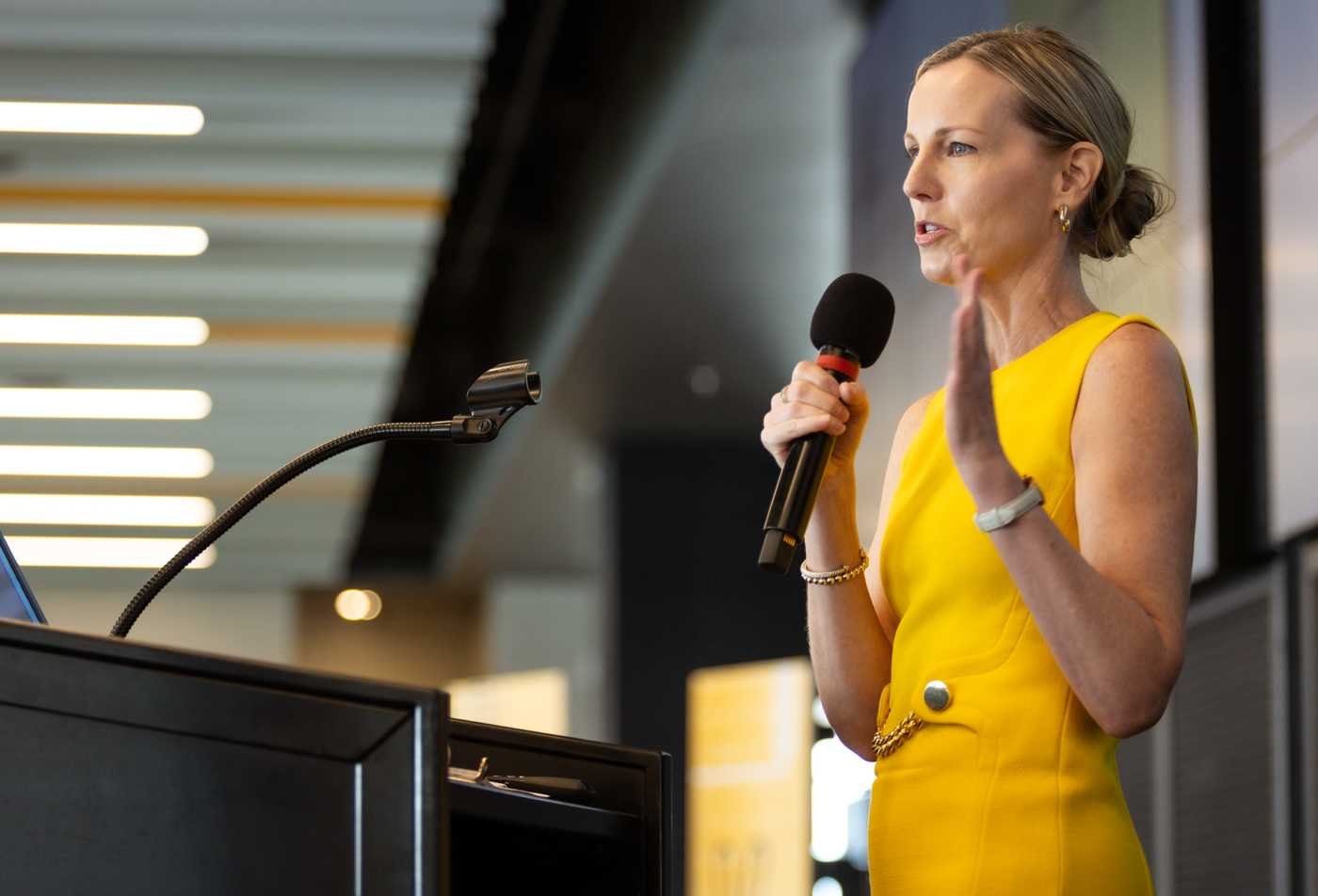 A speaker presents to an audience, reflecting professional communication in ASU's Communication Studies, MA program.