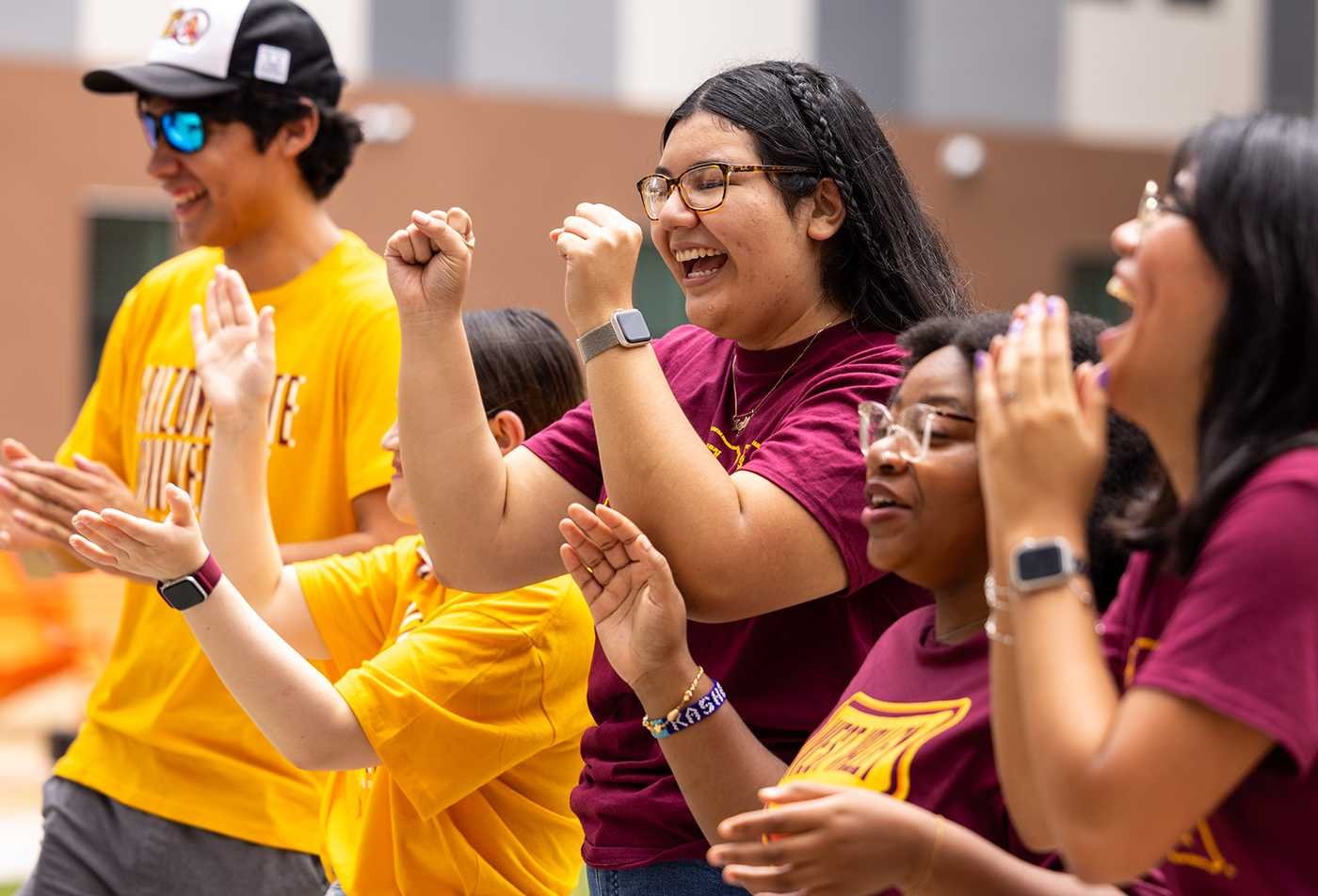 Students celebrate together at a campus event, highlighting community and inclusion in ASU's Disability Studies, BA program.