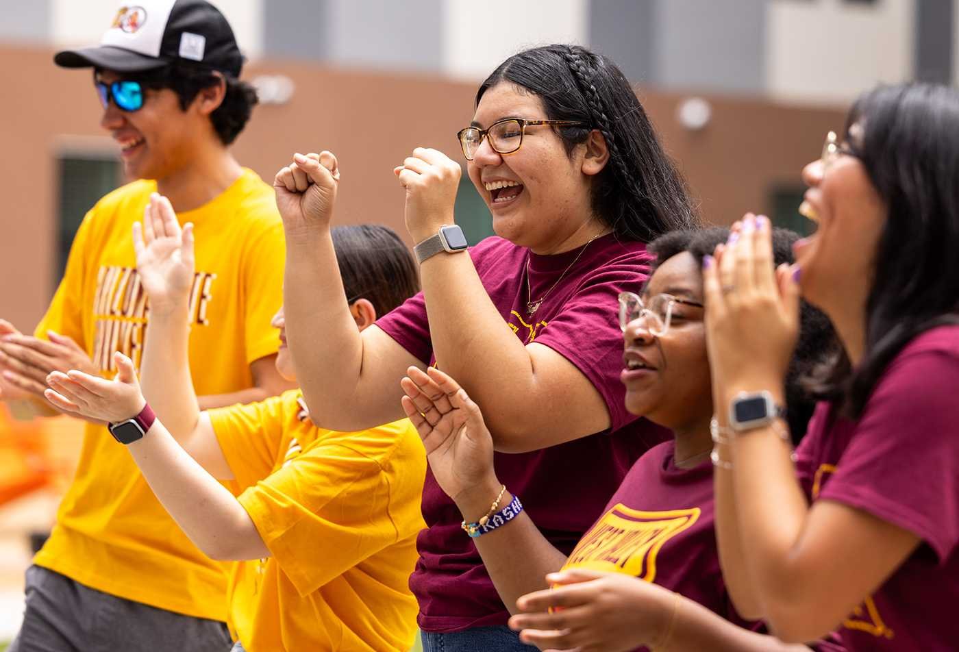 Students celebrate at a campus event, reflecting community and inclusion in ASU's Disability Studies minor.