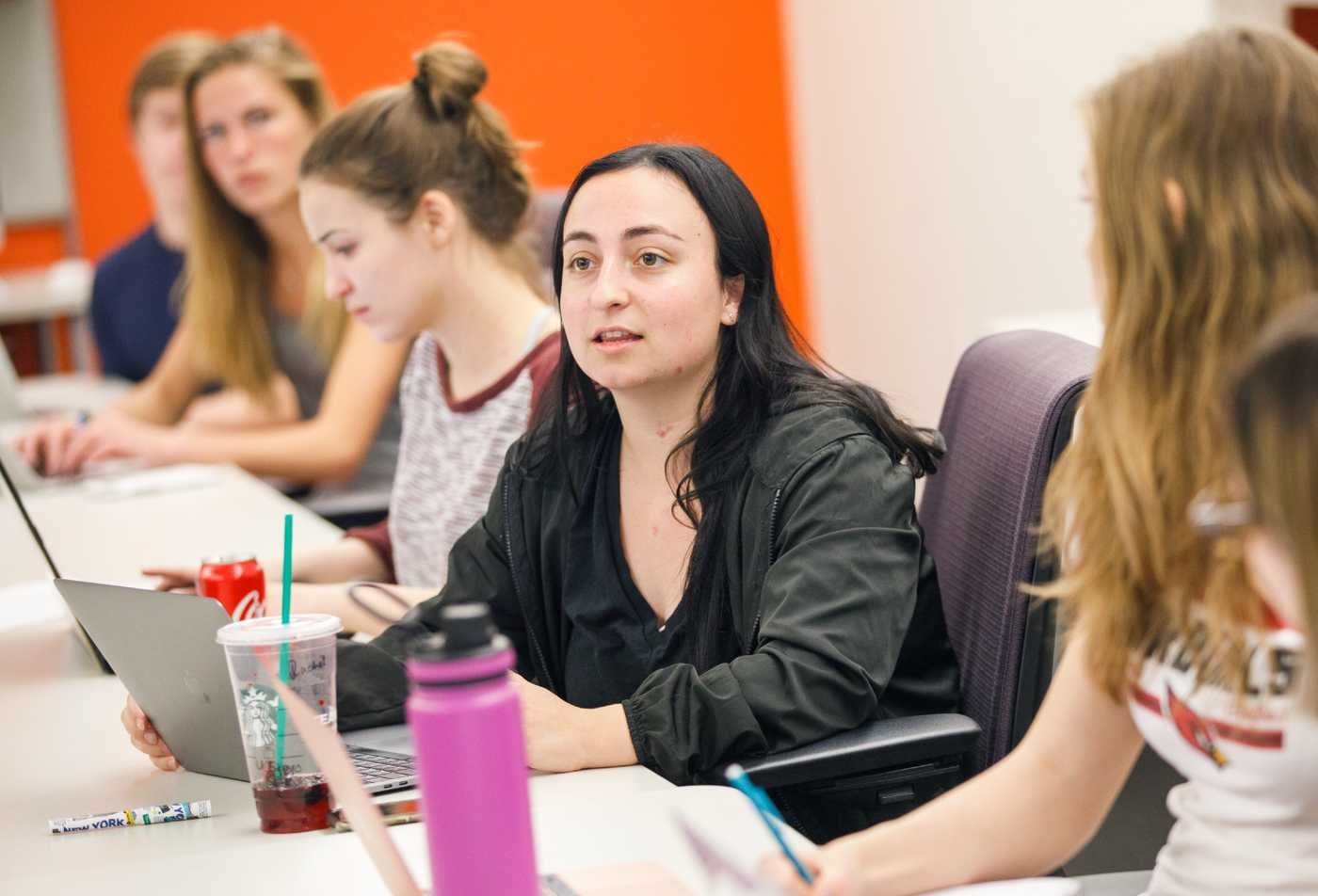 Students collaborate during a class session, examining social dynamics in ASU's Power and Society certificate.