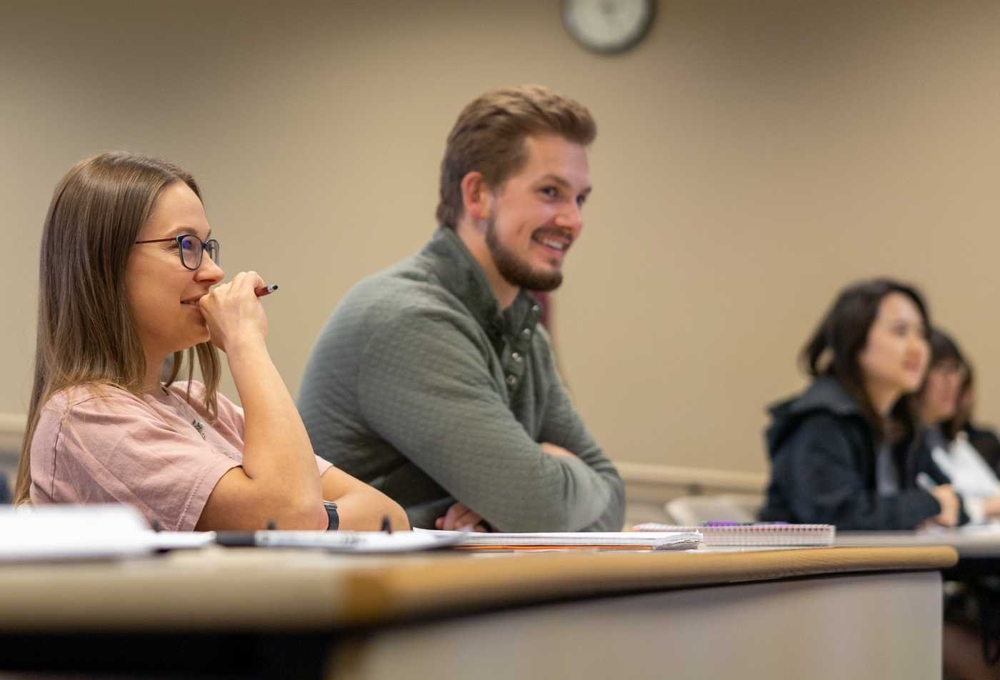 Students discuss ideas in class, exploring belief and society in ASU's Philosophy, Religion and Society, BA program.