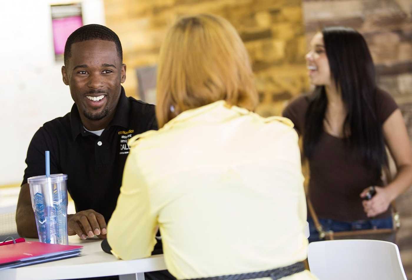 Students discuss ideas in a collaborative setting, exploring human behavior in ASU's Social and Behavioral Sciences, BA program.