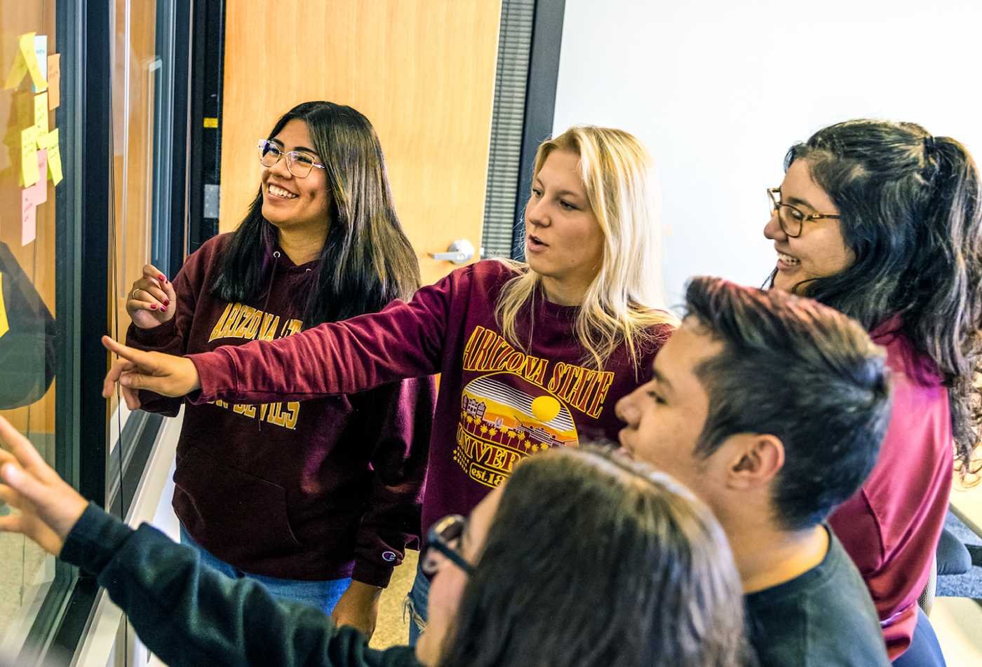 Students organize ideas with sticky notes, building strategic messaging skills in ASU's Public Relations and Strategic Communications minor.